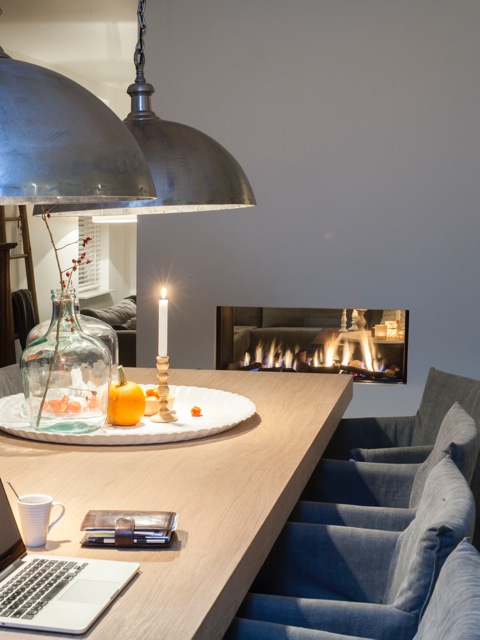 Doorkijkhaard op tafelhoogte en als ruimteverdeler tussen eetkamer en woonkamer - Faber Aspect Premium ST L